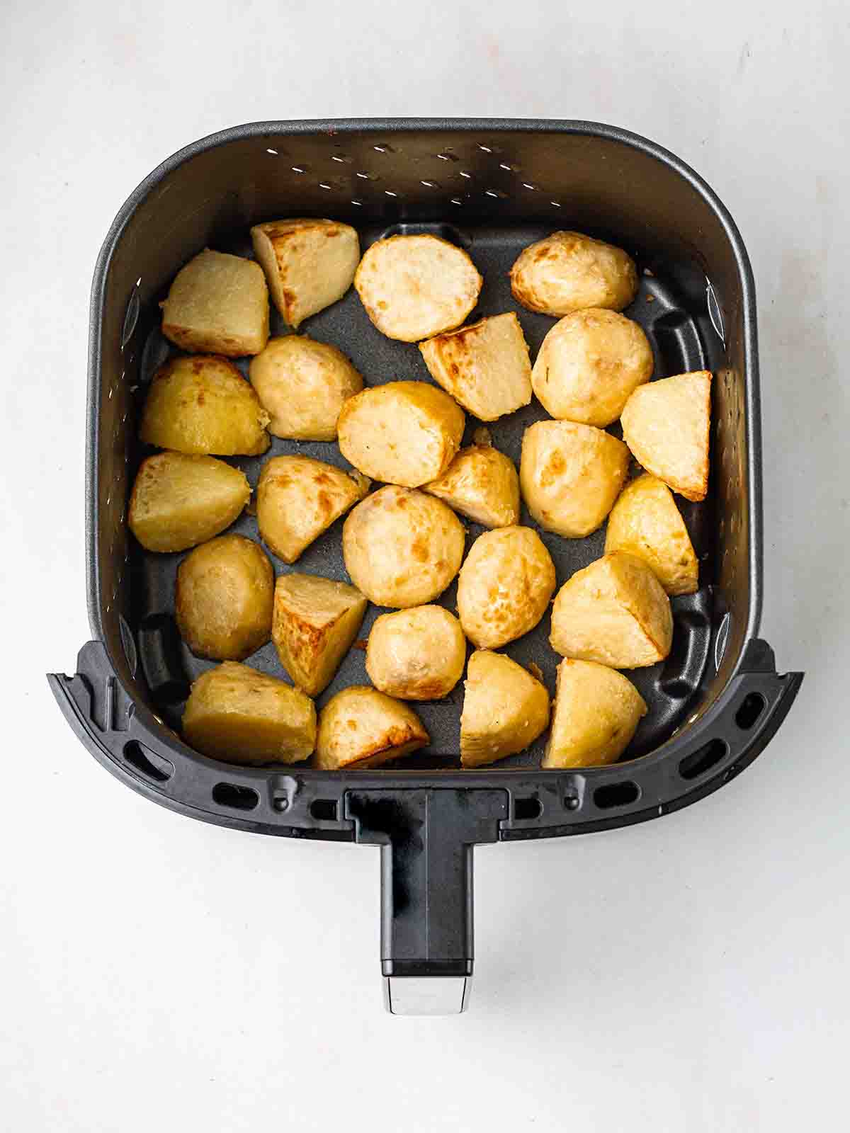 Part roasted potatoes in an air fryer for step 4 in the recipe.