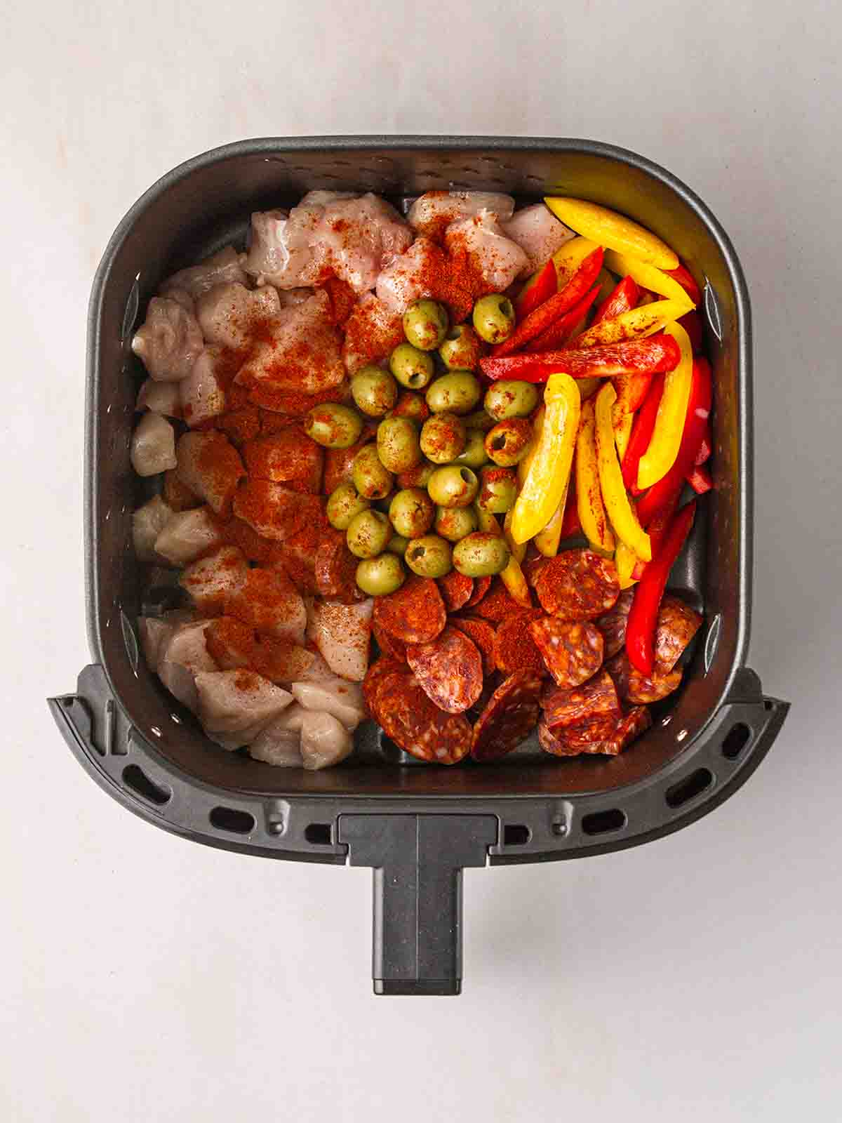 The raw ingredients for Spanish Traybake in an air fryer for step 1 in the recipe method.
