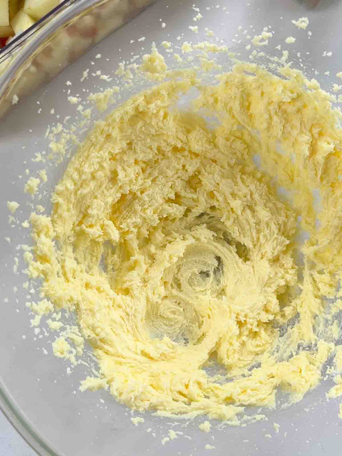 Whisked butter in a bowl.
