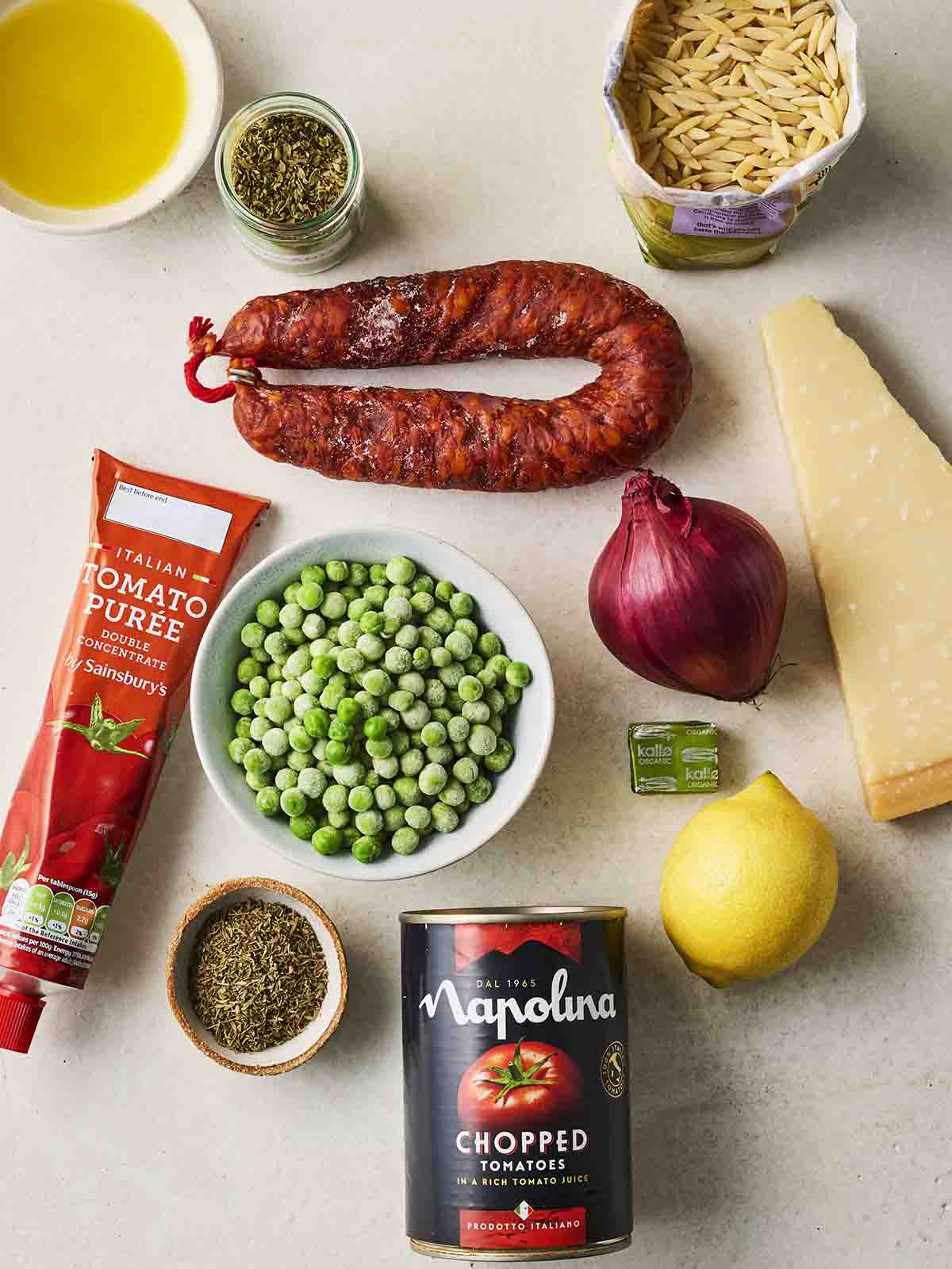 The ingredients for Chorizo Orzo laid out on a counter top.