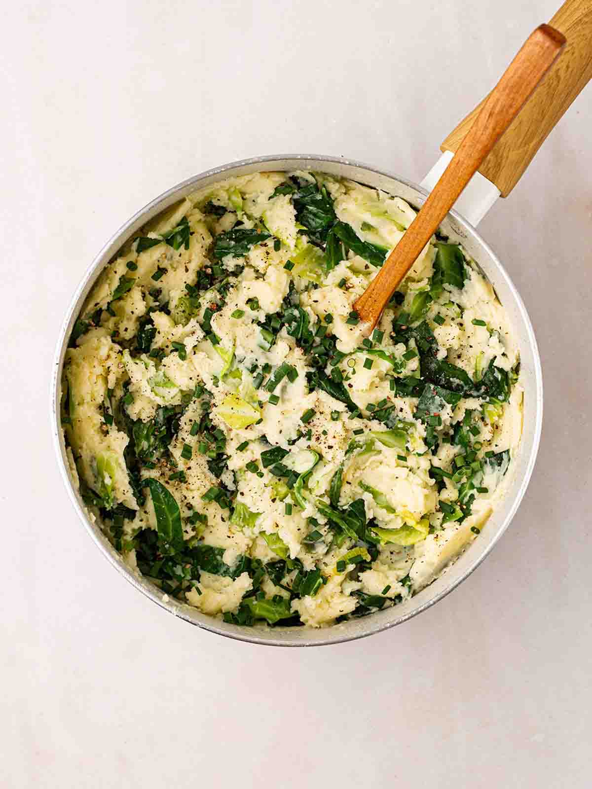 A pan filled with creamy colcannon mashed potato.