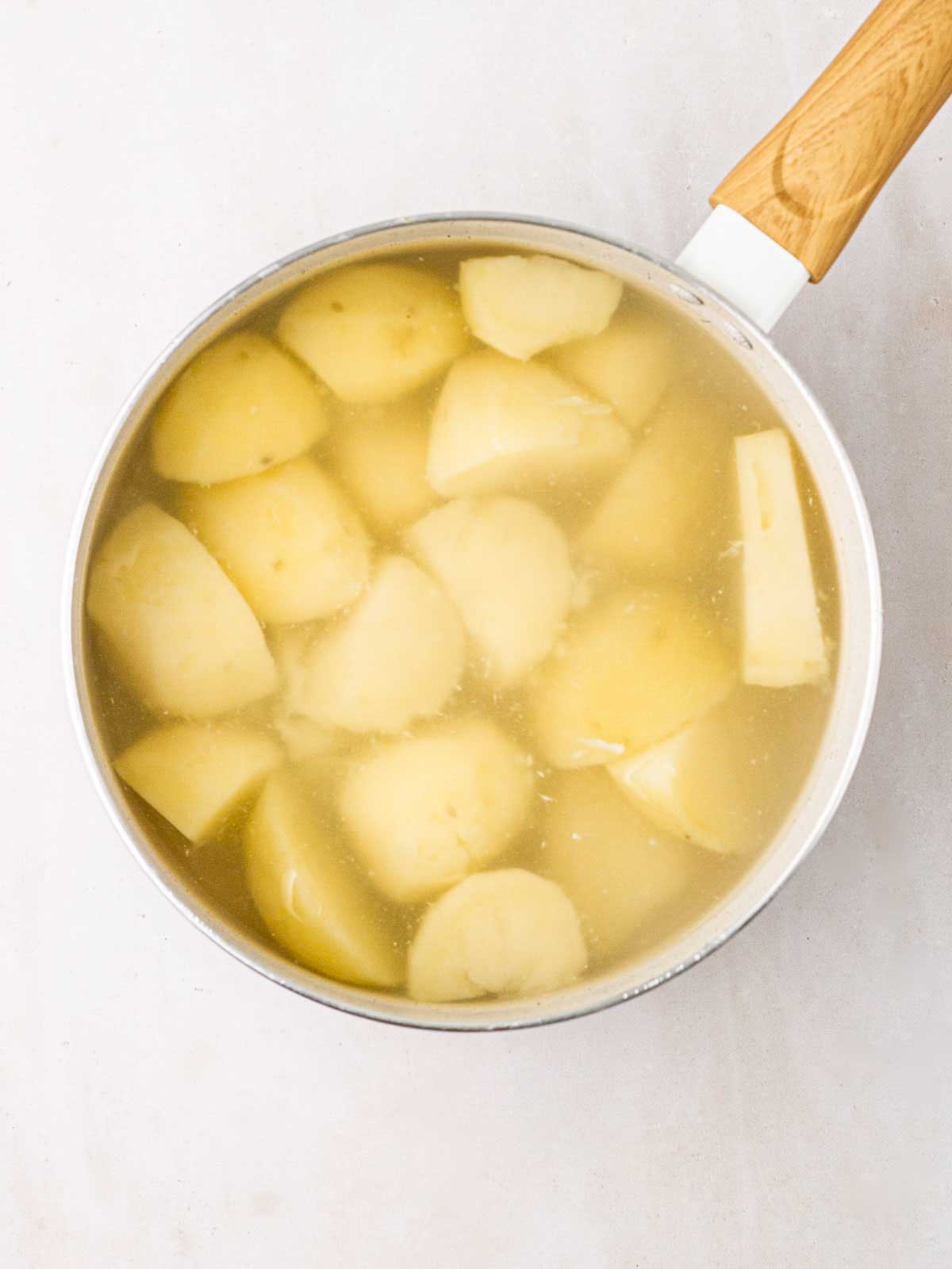 A pan filled with potatoes for a colcannon recipe.