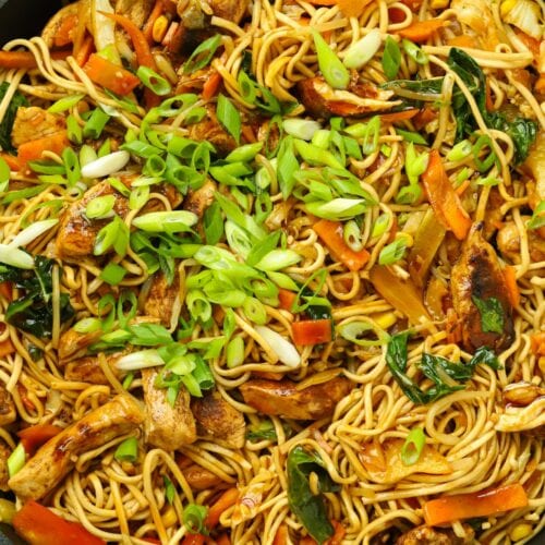 A pan with stir fried noodles and chicken and veggies for Chicken Chow Mein easy recipe.
