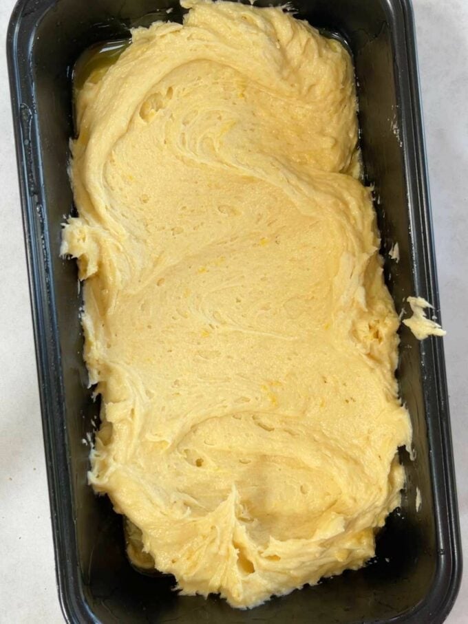 Lemon Drizzle Cake mixture in a loaf tin, ready to go in the oven. Recipe Step 3.