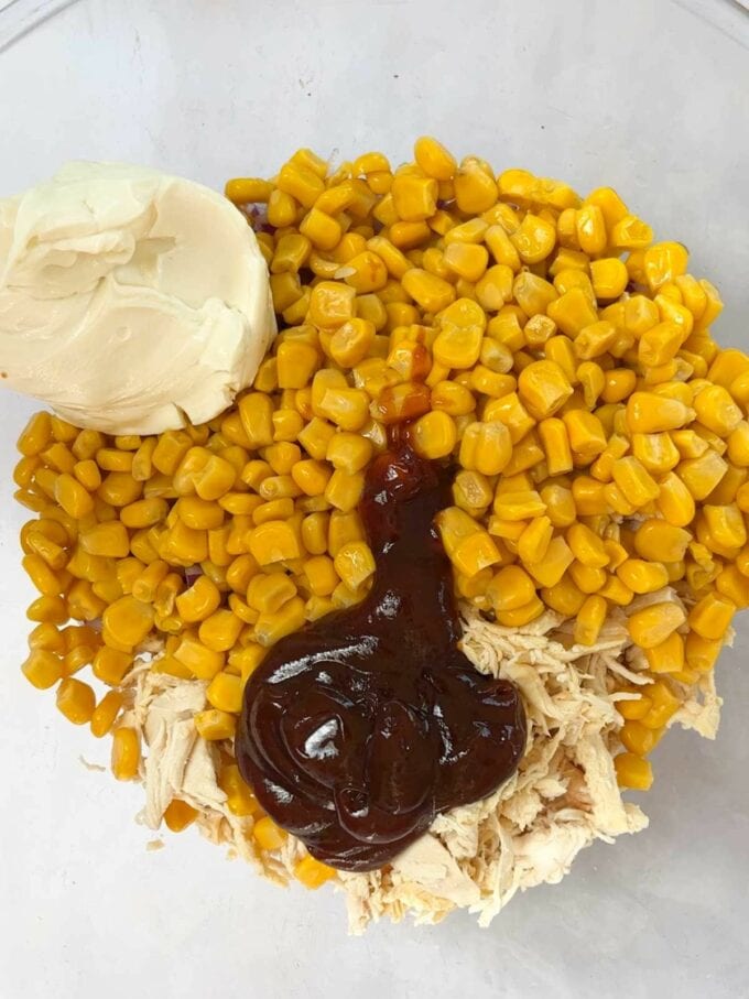 Step 2 in the recipe for Chicken Wraps. Mix the ingredients together in a bowl.