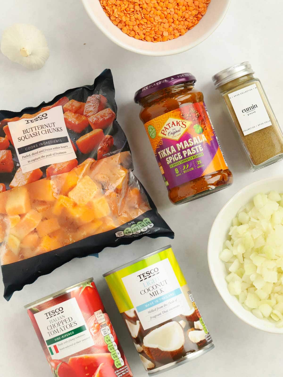 Ingredients for a Slow Cooker Dahl recipe laid out on the counter.