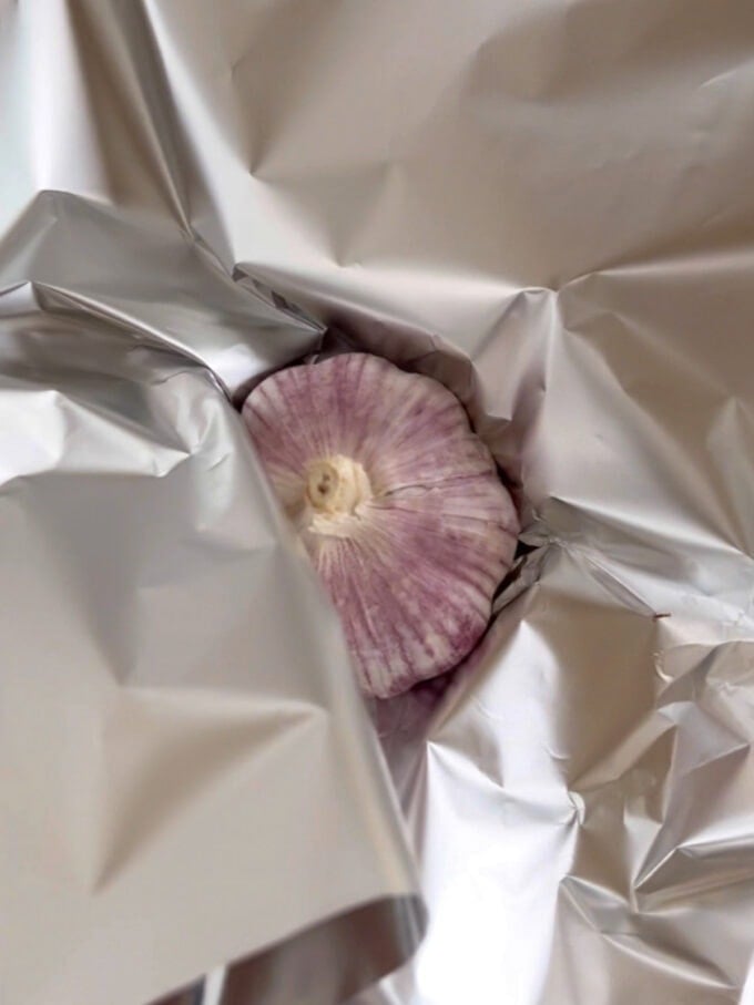 Step 4 of how to make a homemade doner kebab with mince. Add garlic.