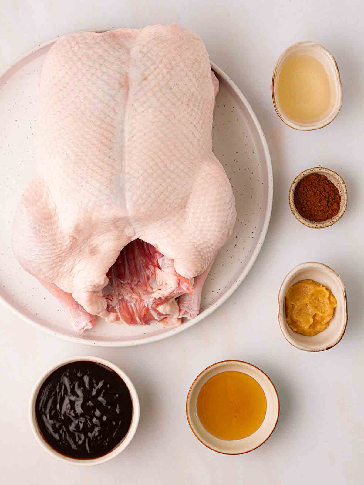 The ingredients to make Slow Cooker Peking Duck laid out on a counter top.