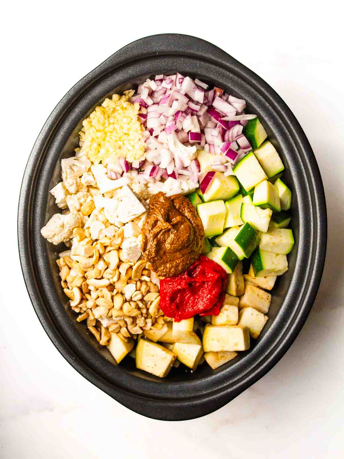 Step 1 showing putting all of the raw ingredients into the slow cooker.