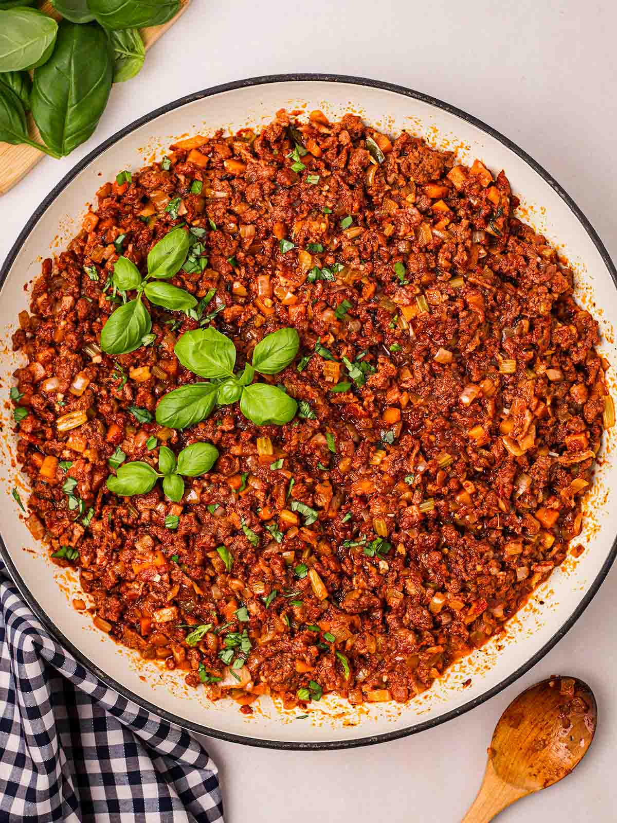 A large pan filled with bolognese sauce.