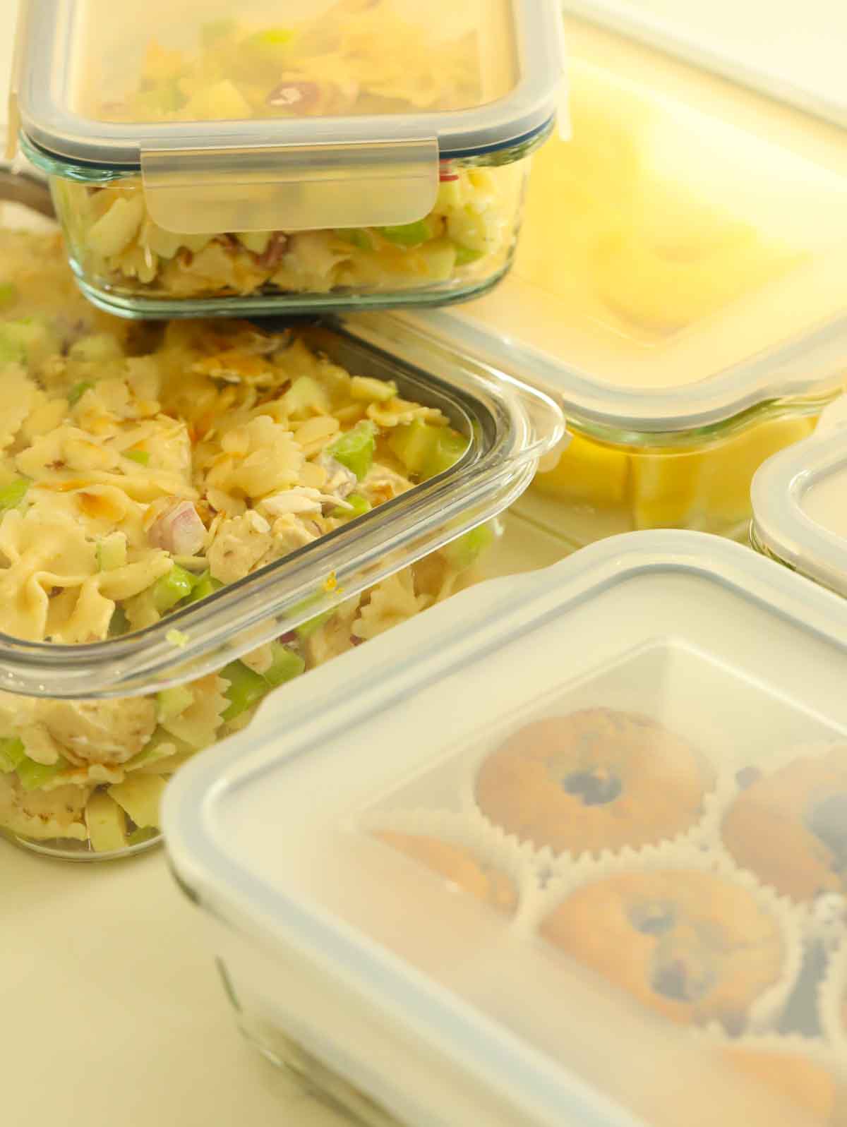 Filled food containers with pre-prepared meals and snacks for the week ahead.